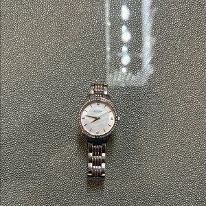 Bulova Silver Timepiece with White Dial